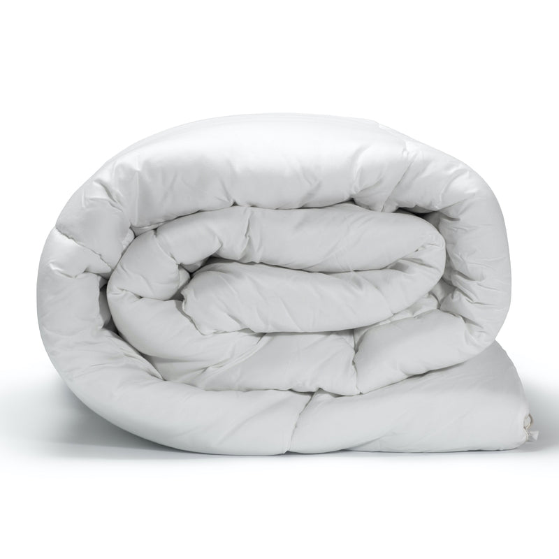 A rolled up white 7.5 fog soft & airy duvet displayed on a neutral background.