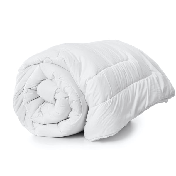 A rolled up 4.5 Tog Soft 
white summer duvet displayed on a white background.