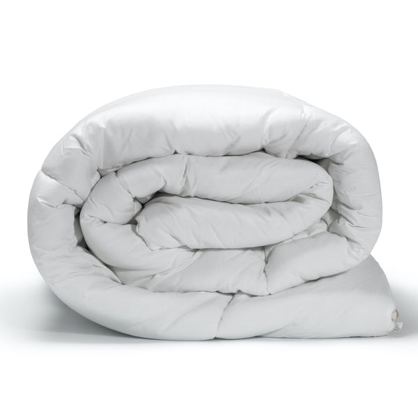 A rolled up white 7.5 fog soft & airy duvet displayed on a neutral background.